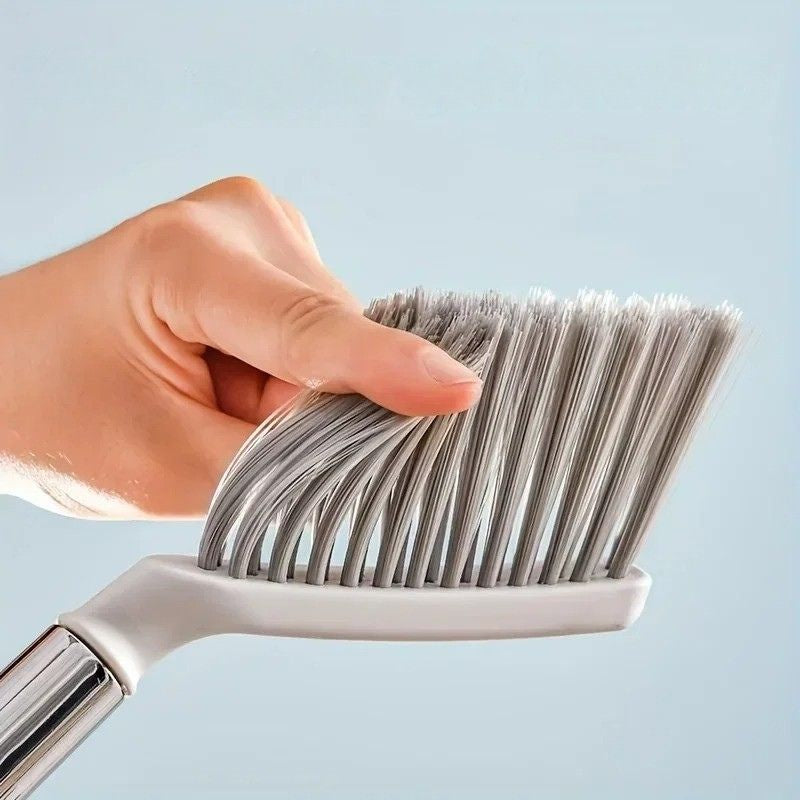 pelle-et-balayette-design-vert-orange-blanc-poils-flexibles